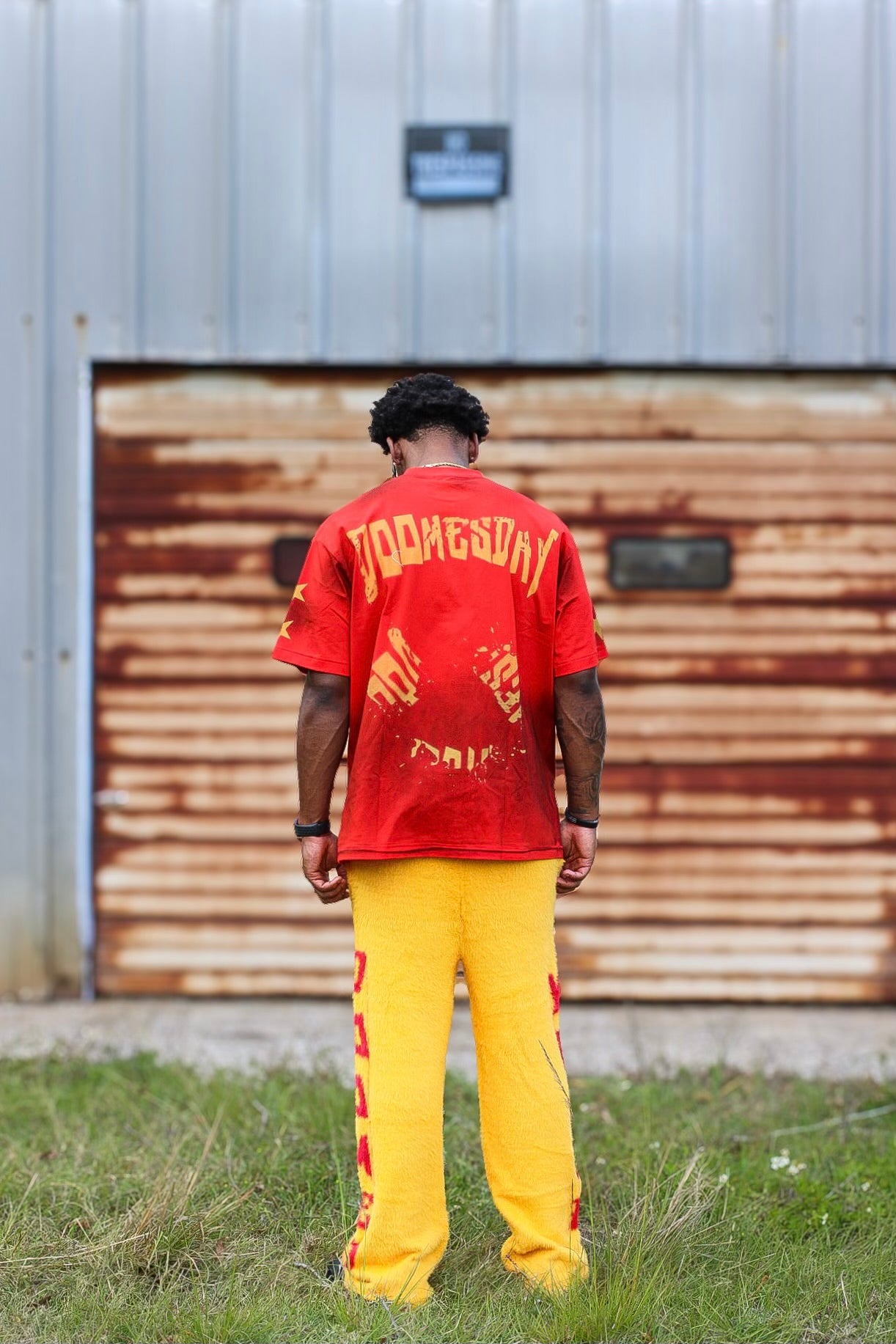2036 Prophecy red tee worn with yellow cozy pants